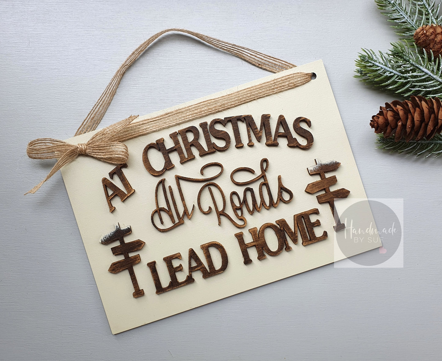 At Christmas All Roads Lead Home Hanging Sign